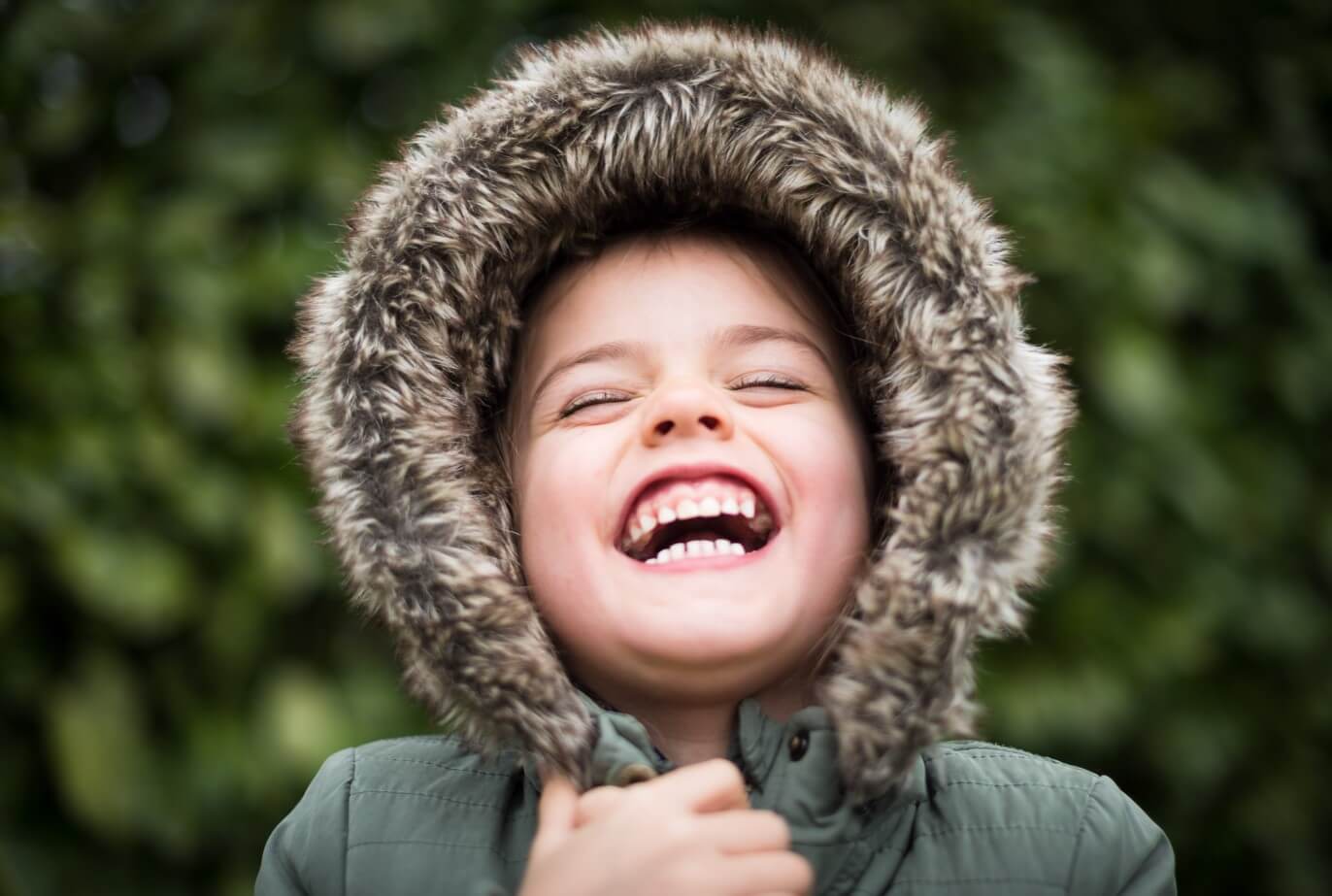 Child Smiling About Early Orthodontic Treatment