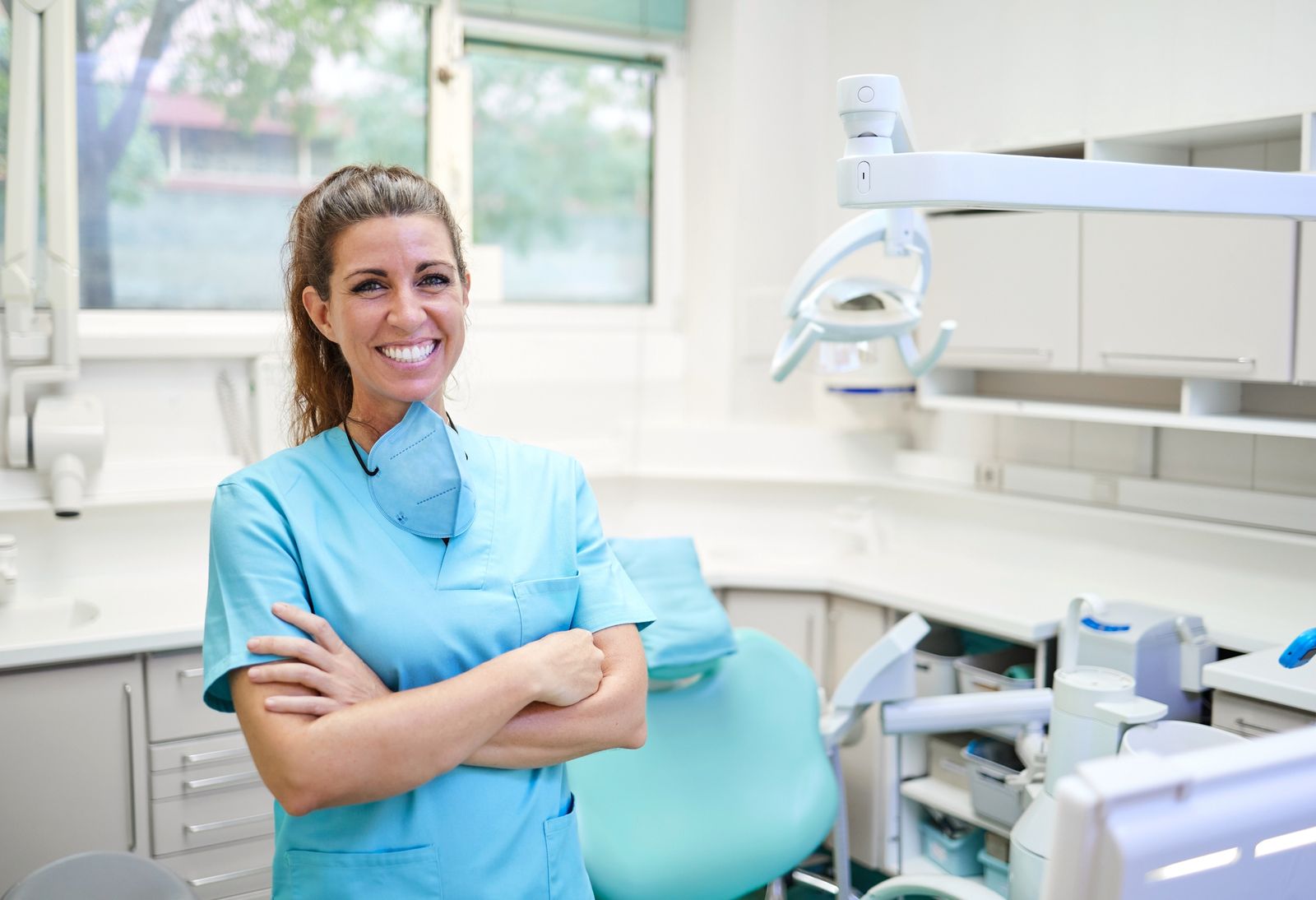 Cheerful Female Dentist In Office